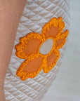 Beige Quilted Silk Dress with Orange Floral Appliqué – Perfect Girls wear for Celebrations - Swati Golyan