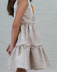 Girl's Beige Tiered Silk Dress with Floral Appliqué - Swati Golyan