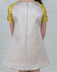 Girl's Beige Quilted A-Line Dress with Hand Embroidered Raglan Sleeves - Swati Golyan