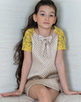 Girl's Beige Quilted A-Line Dress with Hand Embroidered Raglan Sleeves - Swati Golyan