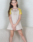 Girl's Beige Quilted A-Line Dress with Hand Embroidered Raglan Sleeves - Swati Golyan