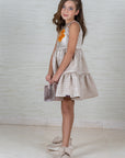 Beige Tiered Silk Dress with Floral Appliqué